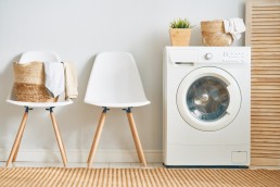 laundry room with a washing machine